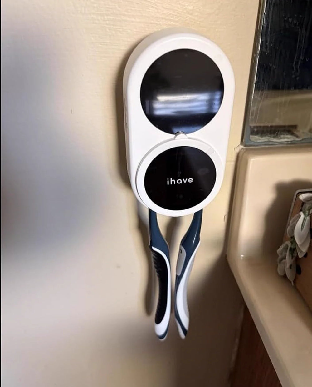A game changer toothbrush holder with convenient touchless operation and dual drying